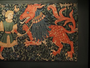 more detailed images of the embroidery and tapestry below