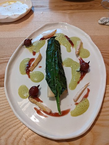 20230427_PXL110336488_Pixel3a-JEB-1 second course: Asparagus, wild garlic leaf and pickled gooseberries. with a gooseberry sauce and a goat milk and wild garlic sauce