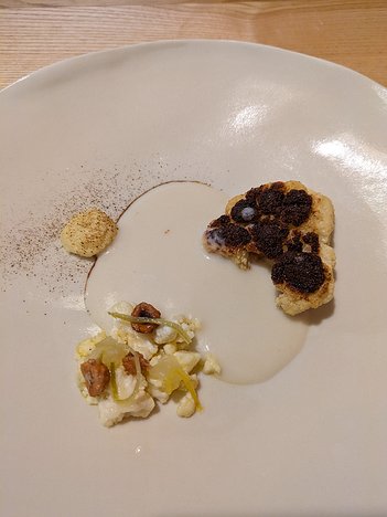 20231104_PXL120653580_Pixel7a-JEB cauliflower in several forms: cauliflower and yuzu paté, roast with yuzu (citrus fruit) and nuts, cauliflower roasted over fire; cold cauliflower sauce