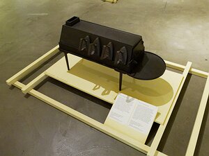 20250724_X7245212_EM1II_DxOstd cast iron stove with irons